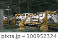 Aerial Car Factory 3D Concept: Automated Robot Arm Assembly Line Manufacturing High-Tech Green Energy Electric Vehicles. Construction, Welding Industrial Production Conveyor. Modern technologies 100952324
