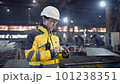 Engineer In Helmets With Tablet Device 101238351