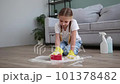 The child washes the floors of the house. The concept of child labor. The assistant. 101378482