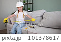 A child in construction overalls. Construction of houses. Home renovation. 101378617