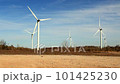 Windmills - Wind Turbines set against blue skies 101425230