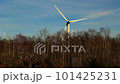 Wind turbine generating clean, green electricity in forest. 101425231