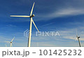 Windmills - Wind Turbines set against blue skies 101425232