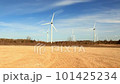 Windmills - Wind Turbines set against blue skies 101425234