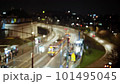 Blurred urban city landscape background, traffic jam city roadway, yellow trams and cars driving crossroad slow motion in evening. Downtown roadway cityscape, rush hour after work, car lights bokeh 101495045