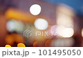 Bokeh city life, cityscape blurred background, urban street illuminated in evening. Yellow bus public transport and people walking in slow motion. Downtown cityscape, illuminate lights 101495050