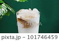 Iced cappuccino close up on green background 101746459