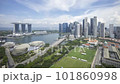 Time lapse of cloudscape scene aerial view at Marina Bay Singapore city skyline. Tilt up 101860998