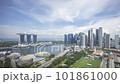 Time lapse of cloudscape scene aerial view at Marina Bay Singapore city skyline. Tilt down 101861000