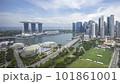 Time lapse of cloudscape scene aerial view at Marina Bay Singapore city skyline. Pan right 101861001