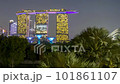 4k time lapse of sunset day to night scene at Marina Bay Singapore city skyline. Pan left 101861107