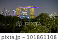4k time lapse of sunset day to night scene at Marina Bay Singapore city skyline.  101861108