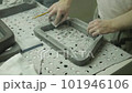 Manual labor for details in the manufacture of furniture. polishing metal parts 101946106