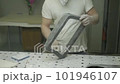 Manual labor for details in the manufacture of furniture. polishing metal parts 101946107