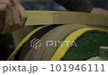 Manual labor for details in the manufacture of furniture. polishing wooden parts 101946111