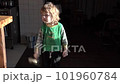 a little boy is having fun in the kitchen 101960784