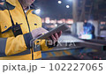 Engineer In Helmets With Tablet Device 102227065