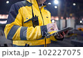 Engineer In Helmets With Tablet Device 102227075