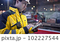 Engineer Is Using Tablet Pc In Factory. Slow-Motion. 102227544