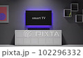 Smart tv turns on in the living room. 102296332