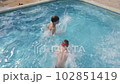 Two boys jumping swimming pool jump water kids swimming boy water fun summer children playing water summer. Cheerful children swiming fun pool children jump kids splashing in pool kids summer holiday. 102851419