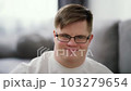 Kind young man with down syndrome against blrred background 103279654