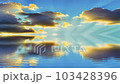 Romantic colorful sunset at the sea. Sun go down, blue and orange 103428396