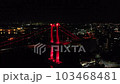 Drone night view of Wakato Bridge over Dokai Bay in Kitakyushu City 1 103468481