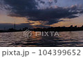Timelapse of river flow and cloud movement in the evening 104399652