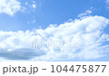 A timelapse of clouds flowing from sunny to cloudy skies 104475877