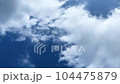 Timelapse of summer clouds flowing in the blue sky 104475879
