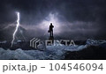 The businessman stands in the middle of a stormy ocean. The concept of a world crisis of business problems and depression in the business world. 104546094