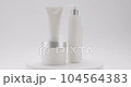 Cosmetics oils based on natural ingredients, scrub, tonic, body care. Natural cosmetics production for hair and skin care. Jars, bottles and tubes rotate for Beauty treatment on a white background. 104564383