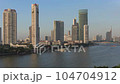 sunset on the Chao Phraya River in the city of Bangkok, Thailand 104704912
