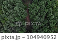 Overhead aerial video of forest and mountain road 104940952