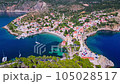 Assos, Greece. Aerial drone flight over picturesque village nestled on the idyllic Kefalonia, Greek Islands. 105028517