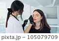 Master of eyebrow correction makes eyebrows 105079709