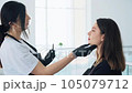Master of eyebrow correction makes eyebrows 105079712