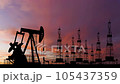 Oil pump on a sunset background. World Oil Industry. Timelapse. 105437359