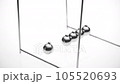 Balancing balls on a white background, isolated. business concept. Newtons Cradle 105520693