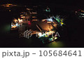 Loading from fishing ships to cargo trucks. Fishermen working under the lights of fishing ships in the harbor.Ideal for fishery industry, night work life.People workers mobility midnight port seaport 105684641