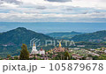 Time lapse of The landscape of Wat Phra That Pha Son Kaew with its five large white Buddha images is unique and features mountains, sky and rain clouds. 105879678