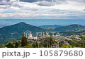Time lapse of The landscape of Wat Phra That Pha Son Kaew with its five large white Buddha images is unique and features mountains, sky and rain clouds. 105879680