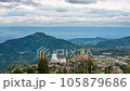 Time lapse of The landscape of Wat Phra That Pha Son Kaew with its five large white Buddha images is unique and features mountains, sky and rain clouds. 105879686