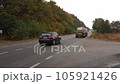 Video of cars on a rainy road, capturing the moody essence of the season 105921426