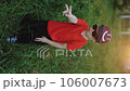 Vertical video of funny boy posing dancing at sunset having fun and positive emotion slowmo. Laughing male kid rejoicing demonstrate dance relaxing at vacation. Younger generation. Lifestyle 106007673