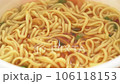 Picking up cup ramen noodles with chopsticks 106118153