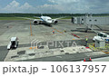 An airplane arrives at the airport and parks 106137957