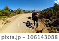 Group of people ride horses by mountain side trail in Turkey 106143088