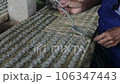 Pouring Cement Discs for Oyster Farming 106347443